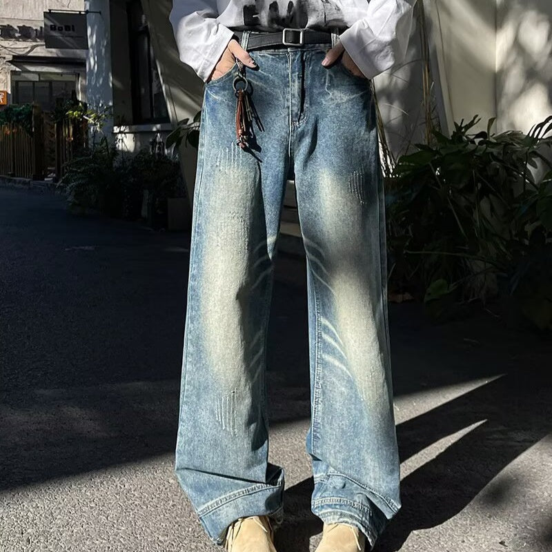 Vintage washed denim jeans for men in autumn